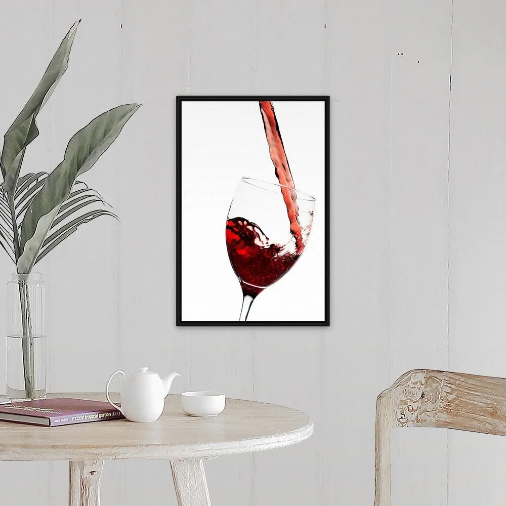 "Close up of red wine being poured into glass on white background" Black Float Frame Canvas Art