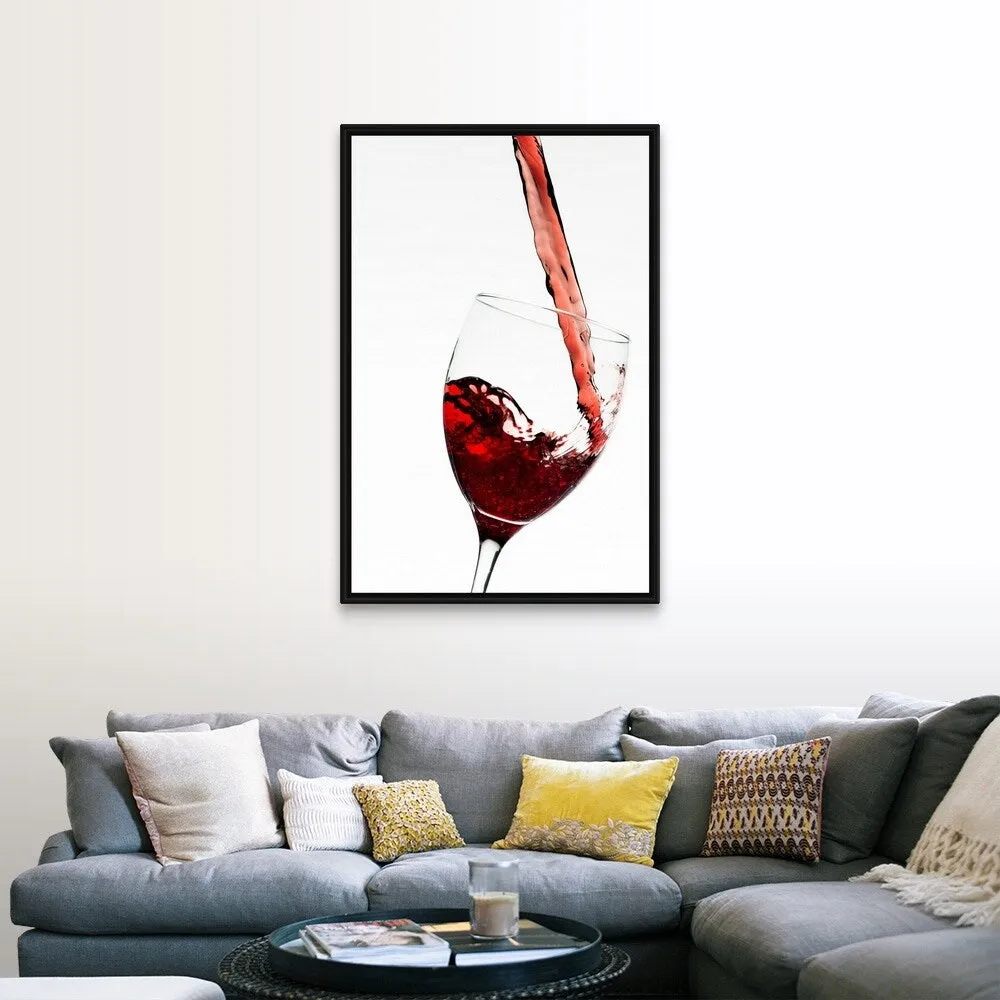 "Close up of red wine being poured into glass on white background" Black Float Frame Canvas Art