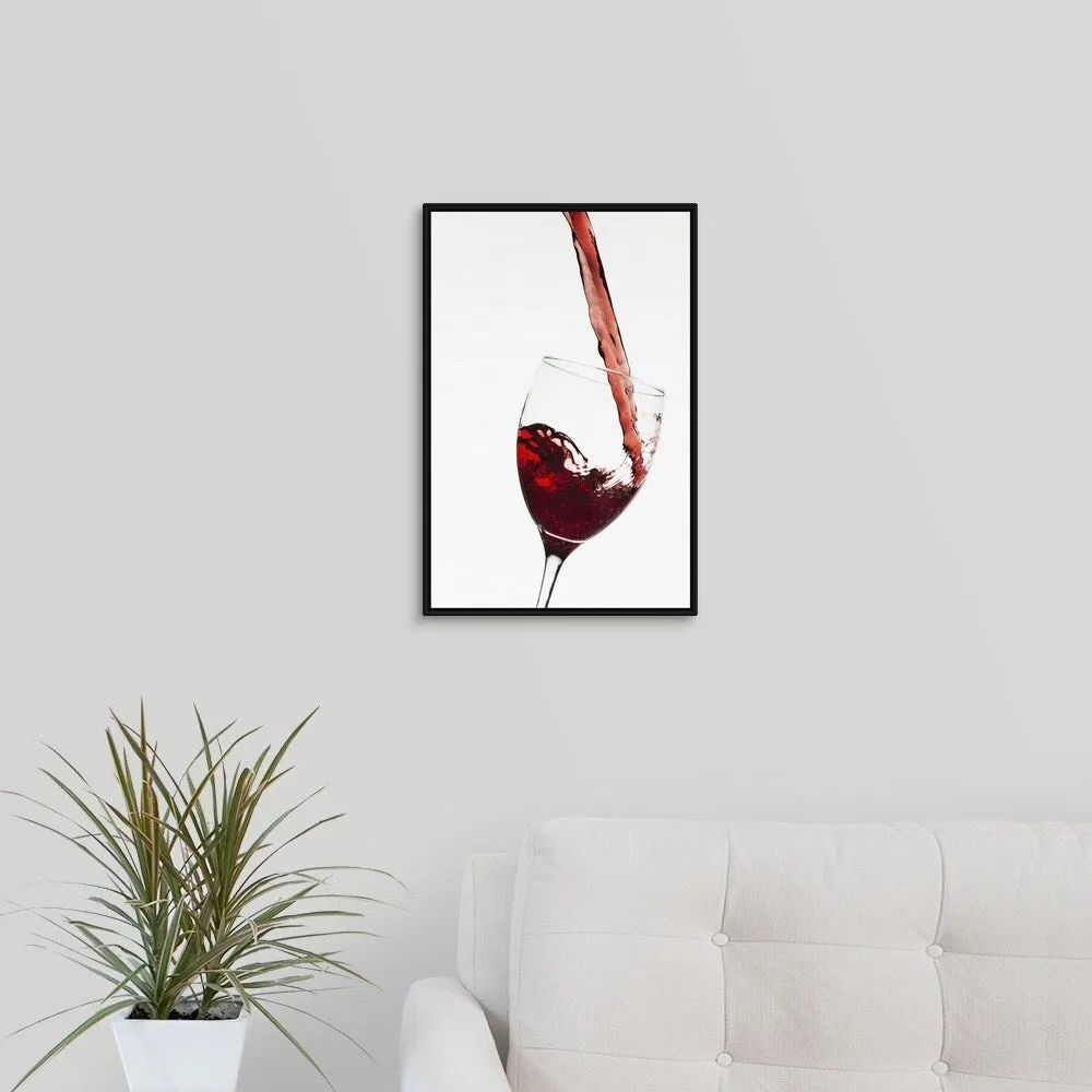 "Close up of red wine being poured into glass on white background" Black Float Frame Canvas Art